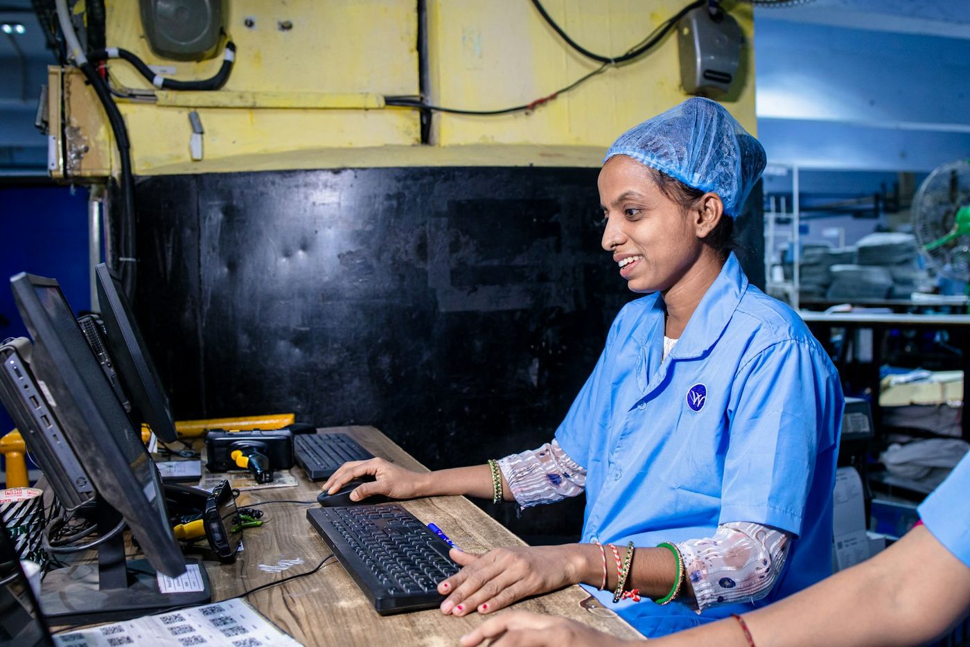 Young woman trainee working at a computer