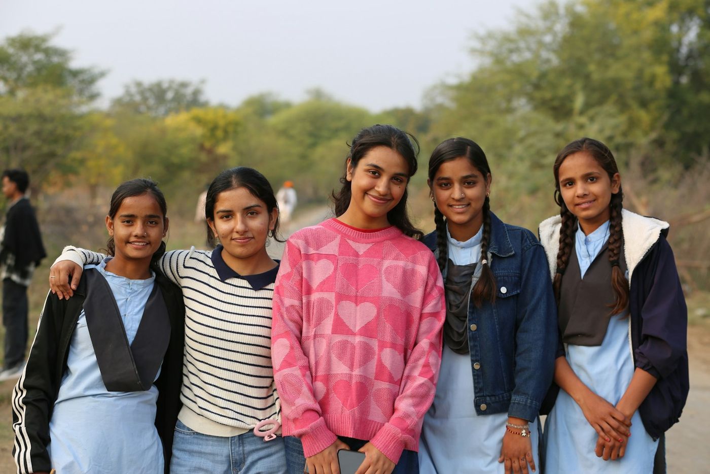 Young women from a village standing together
